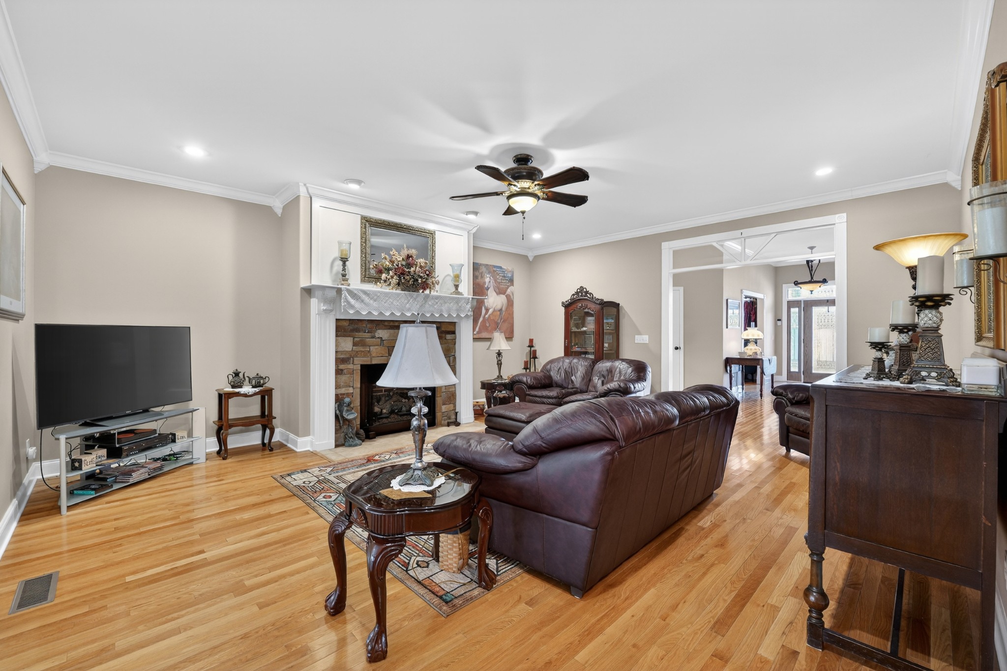 600 Bates Hollow Road Prospect, TN 38477 - Photo 26 of 73 a living room with fireplace furniture and a flat screen tv