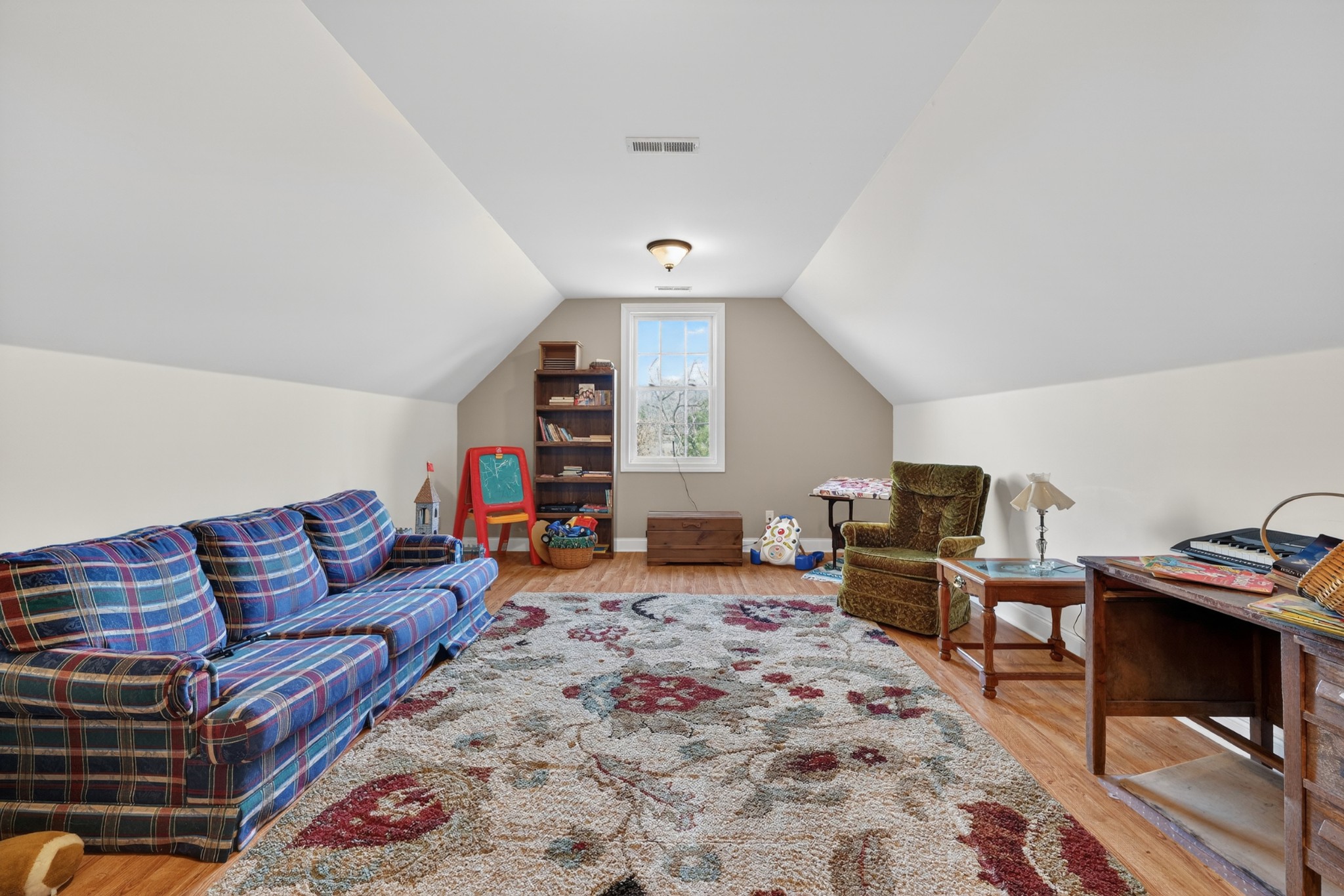 600 Bates Hollow Road Prospect, TN 38477 - Photo 49 of 68 a living room with furniture and a flat screen tv