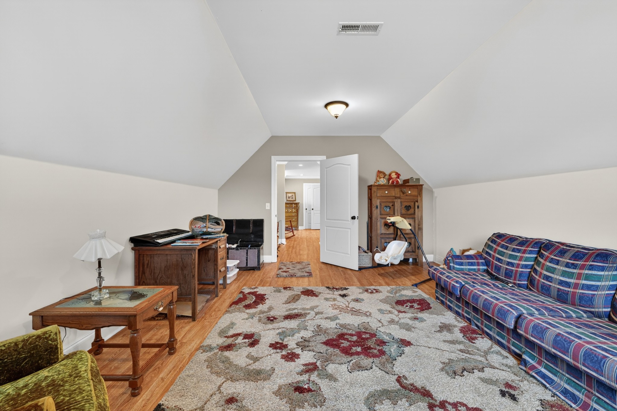 600 Bates Hollow Road Prospect, TN 38477 - Photo 50 of 68 a bedroom with furniture and wooden floor