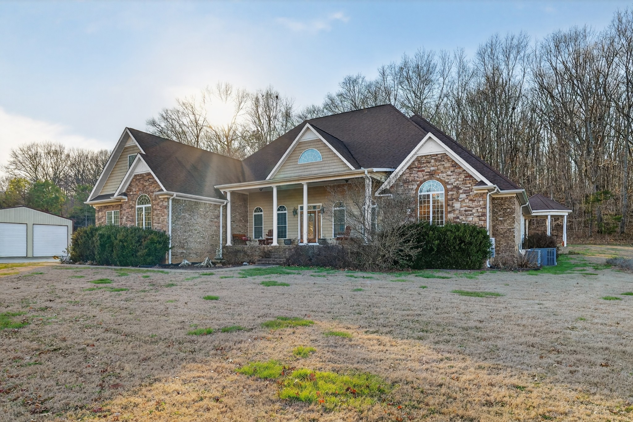 600 Bates Hollow Road Prospect, TN 38477 - Photo 5 of 68 a front view of a house with a yard and garage