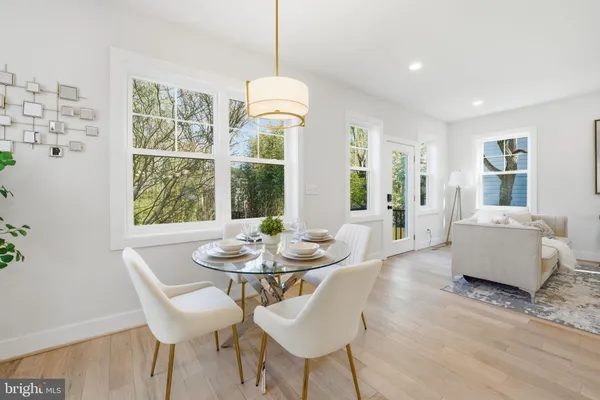 a living room with furniture and windows