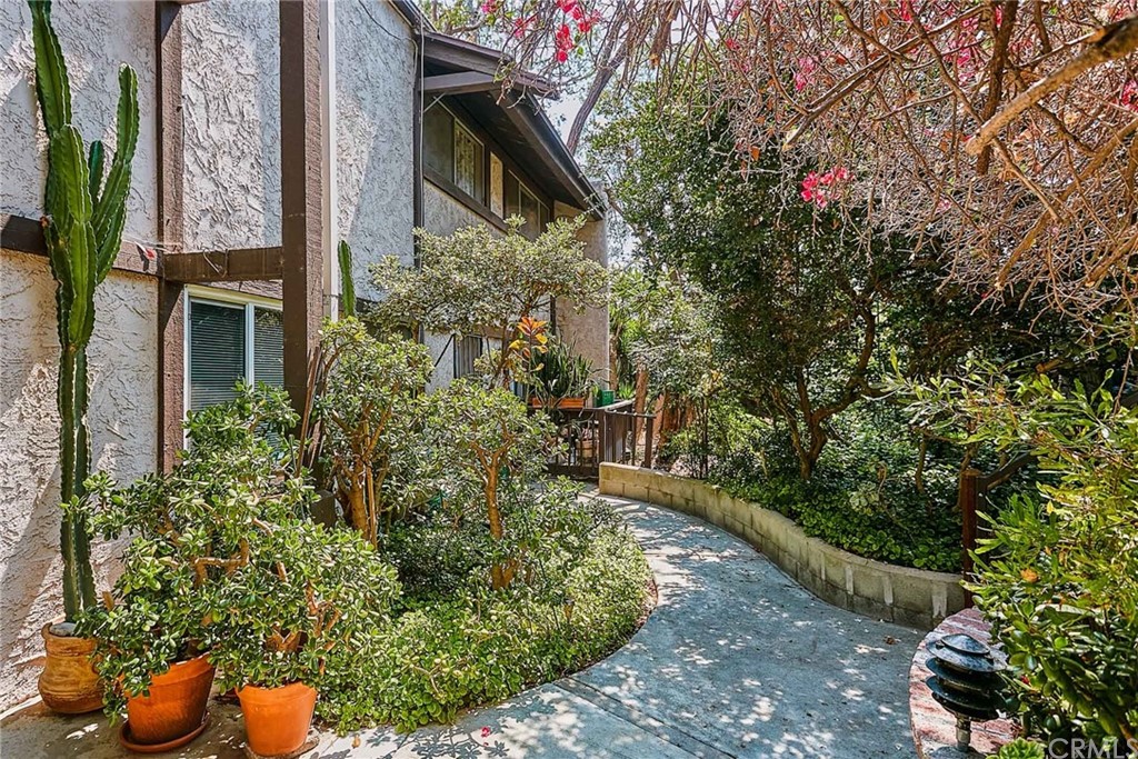 334 Miraleste Drive, Unit 237 San Pedro, CA 90732 - Photo 2 of 20 a view of a yard with plants