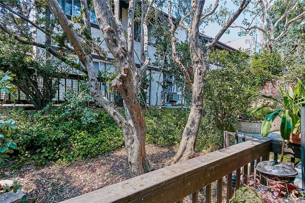 334 Miraleste Drive, Unit 237 San Pedro, CA 90732 - Photo 19 of 20 a view of balcony with wooden fence and trees