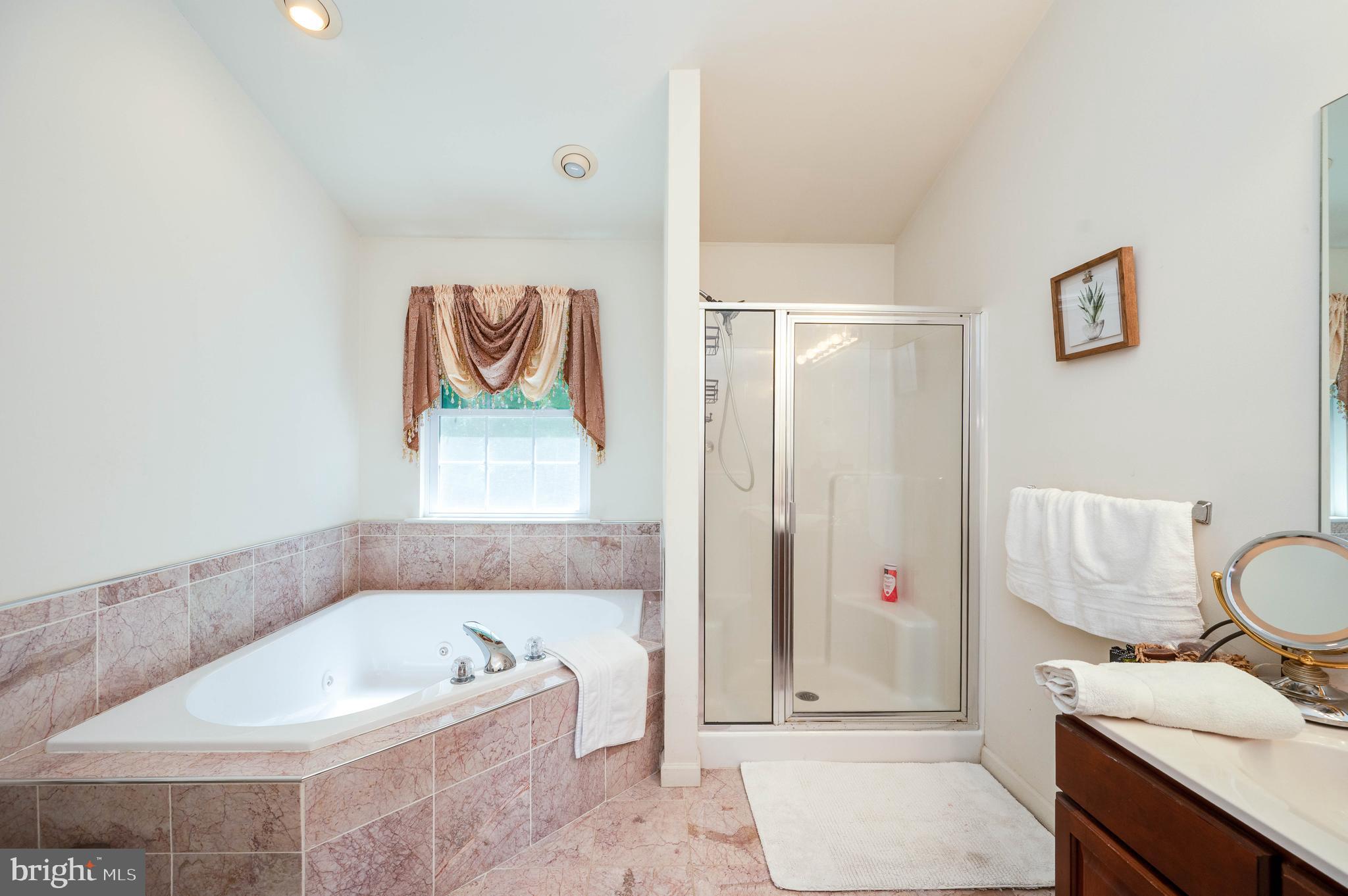 4660 Dunham Drive Reading, PA 19606 - Photo 29 of 48 a bathroom with a tub and a shower