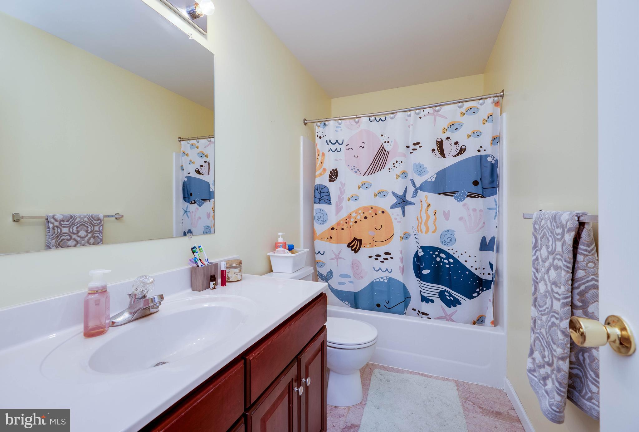 4660 Dunham Drive Reading, PA 19606 - Photo 31 of 48 a bathroom with a sink toilet and vanity