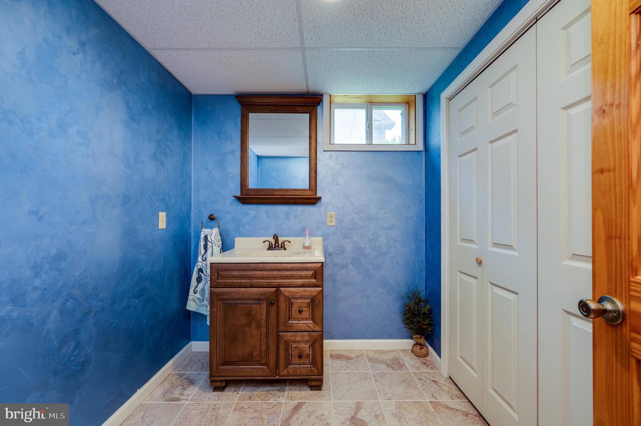 4660 Dunham Drive Reading, PA 19606 - Photo 46 of 48 a bathroom with a sink a toilet and mirror