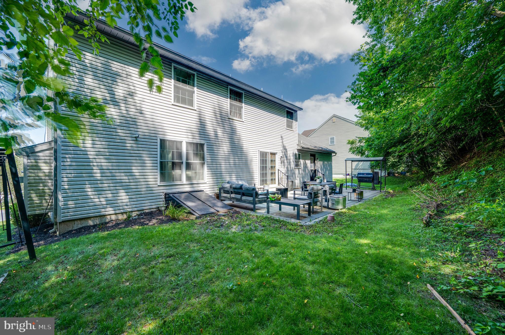 4660 Dunham Drive Reading, PA 19606 - Photo 47 of 48 a view of a house with backyard and sitting area