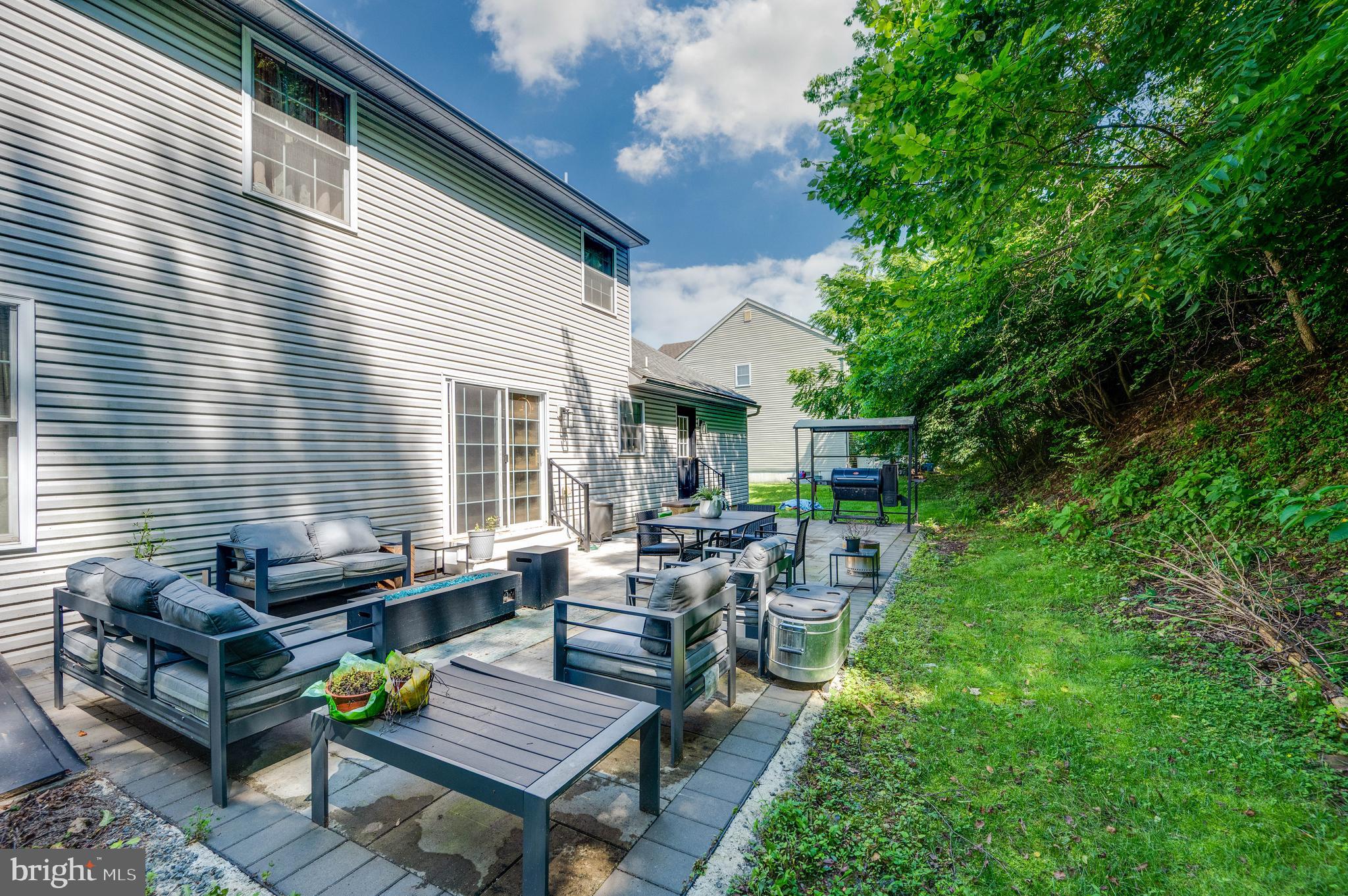 4660 Dunham Drive Reading, PA 19606 - Photo 48 of 48 a view of a patio with chairs and potted plants
