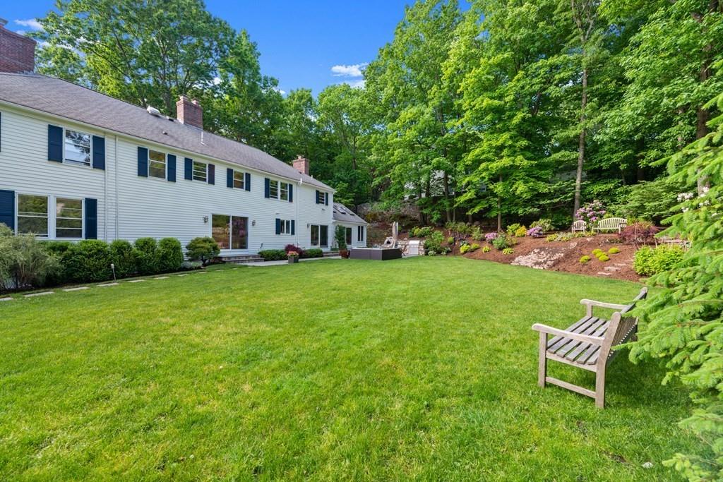 77 Royalston Road Wellesley, MA 02481 - Photo 27 of 30 a house view with a sitting space and garden