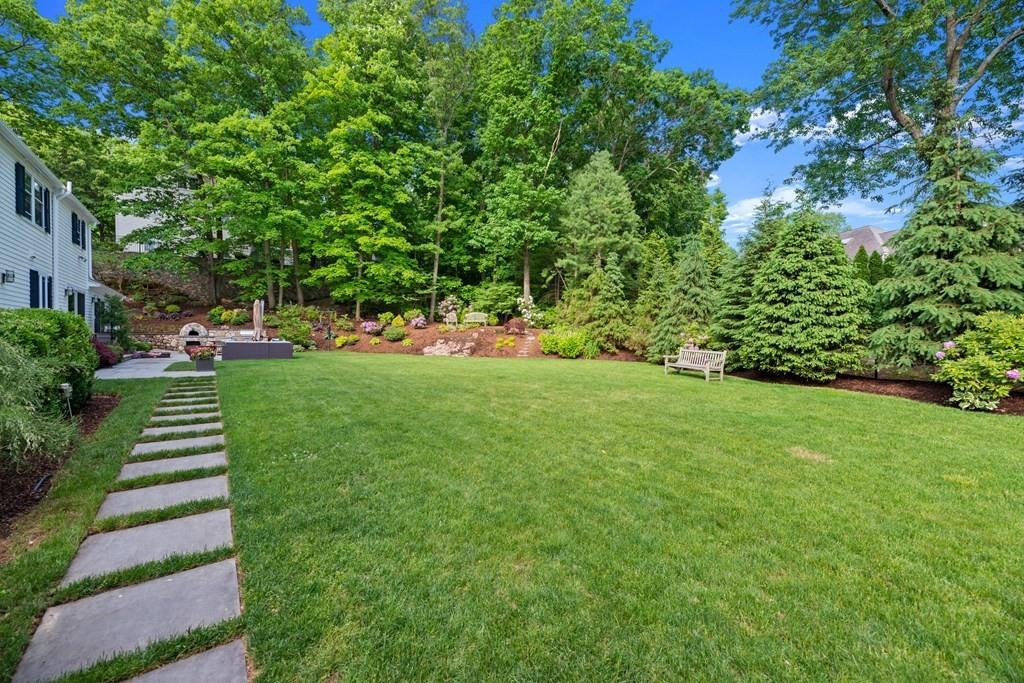 77 Royalston Road Wellesley, MA 02481 - Photo 3 of 30 a view of a garden with plants and trees
