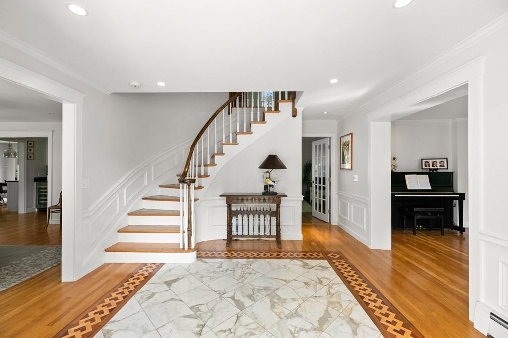 77 Royalston Road Wellesley, MA 02481 - Photo 9 of 30 a view of entryway and hall with wooden floor