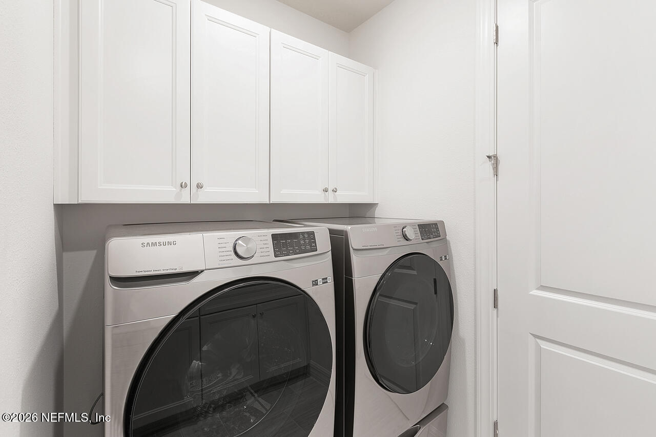 4963 Shell Crk Trail Jacksonville, FL 32226 - Photo 20 of 39 a utility room with dryer and washer