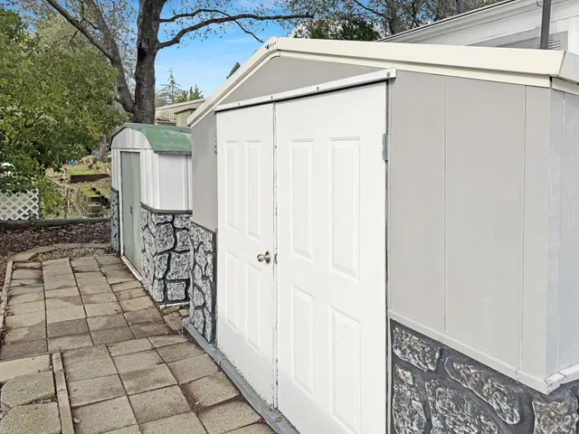 a backyard of a house with lots of green space