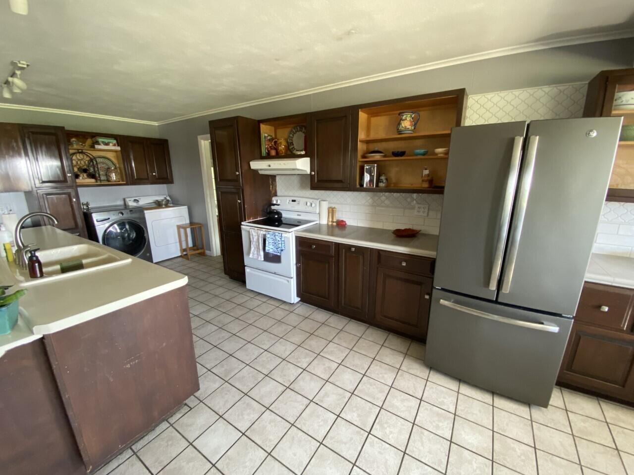 469 Albion Road Unity, ME 04988 - Photo 29 of 56 Kitchen toward mudroom