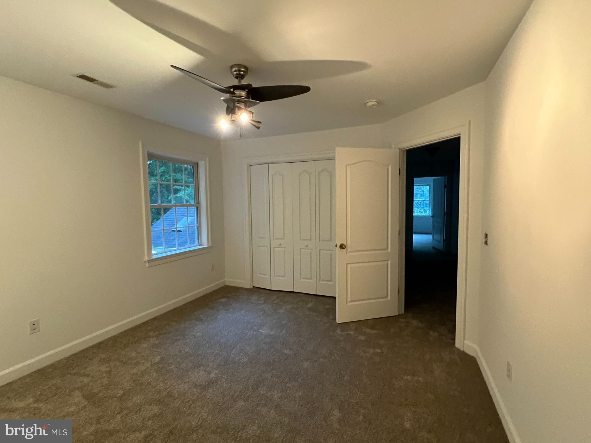1290 College Road Dover, DE 19904 - Photo 25 of 33 a view of an empty room with a window