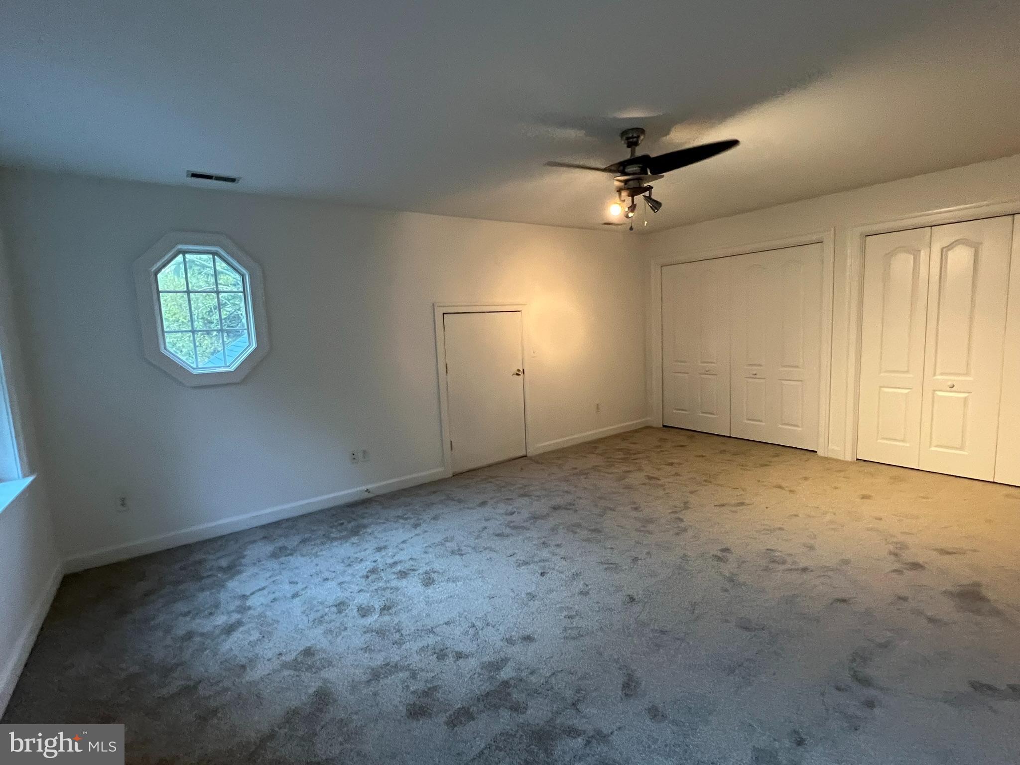 1290 College Road Dover, DE 19904 - Photo 31 of 33 an empty room with a empty space and a window