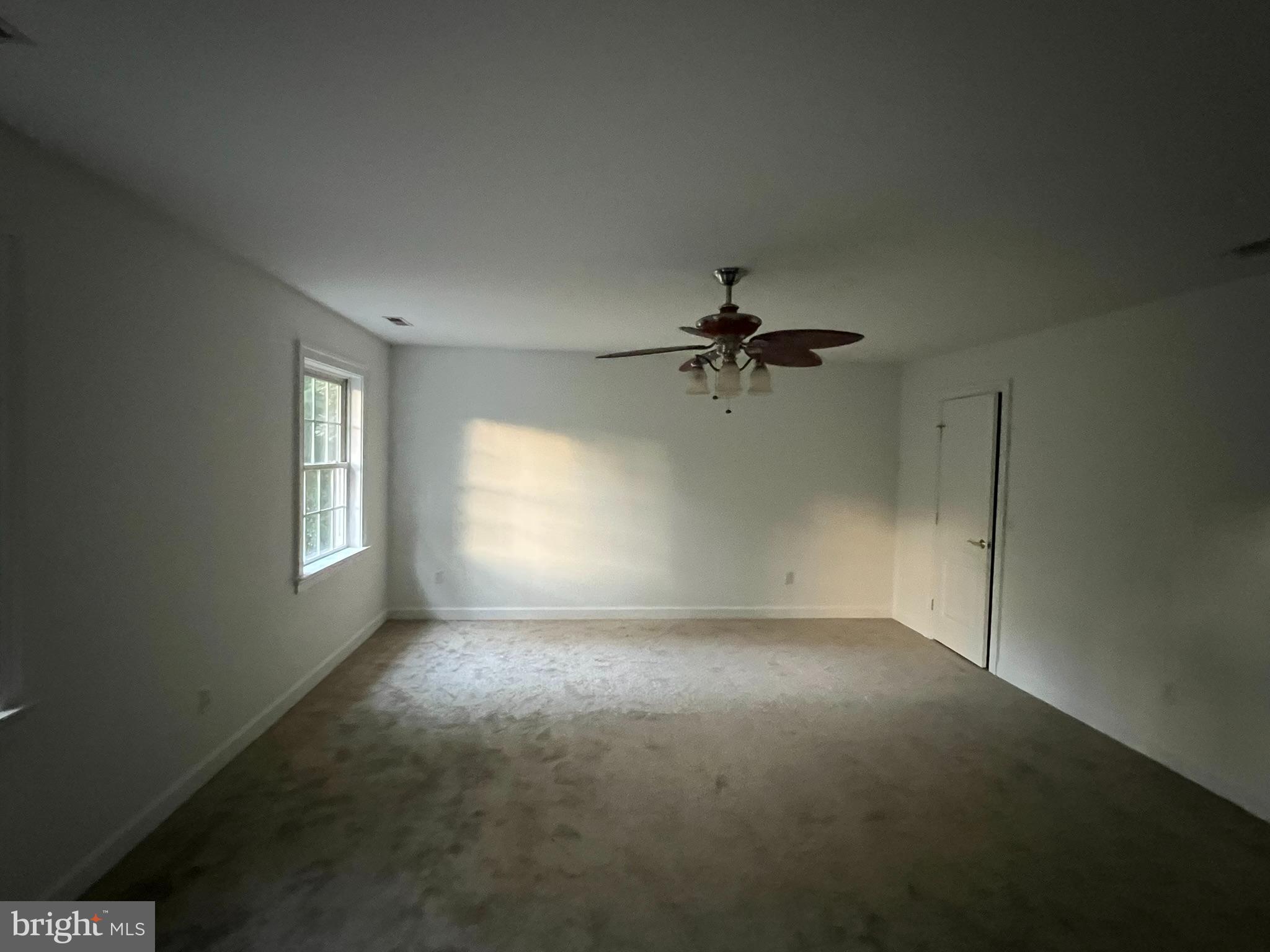 1290 College Road Dover, DE 19904 - Photo 32 of 33 a view of empty room with windows