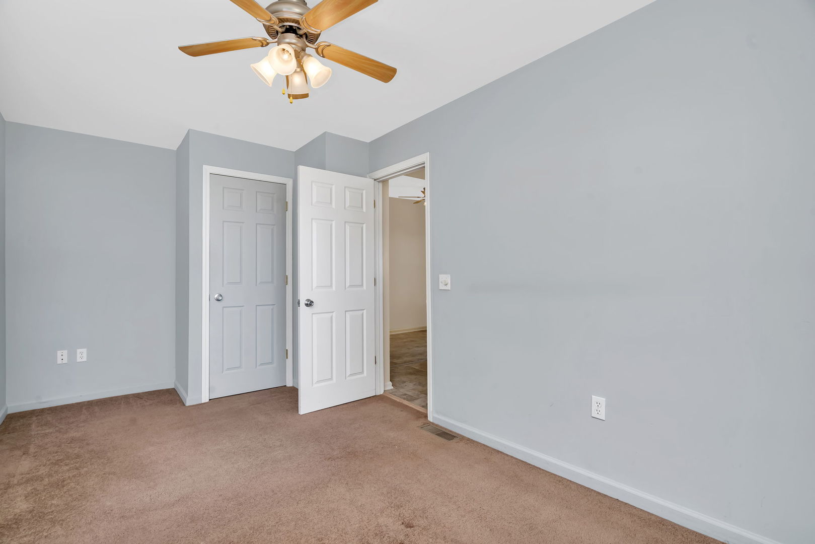212 East Chippewa Street Dwight, IL 60420 - Photo 13 of 32 a view of an empty room and chandelier fan