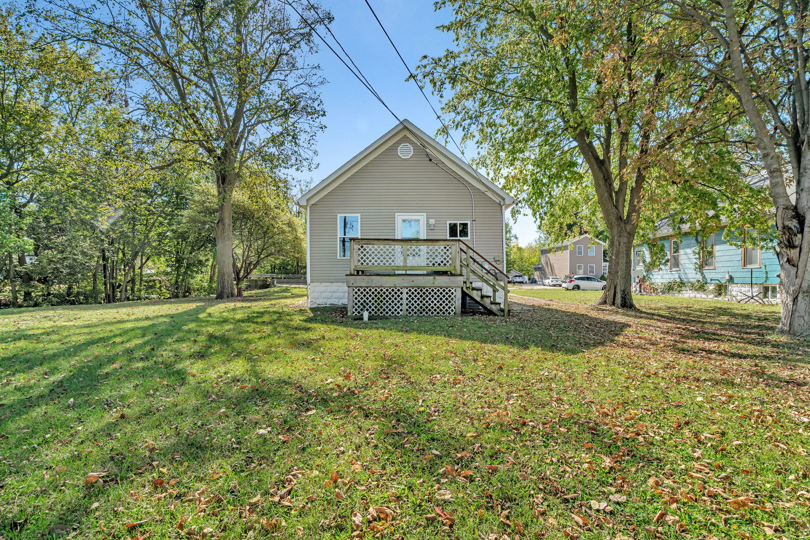 212 East Chippewa Street Dwight, IL 60420 - Photo 25 of 32 a front view of a house with a yard and trees