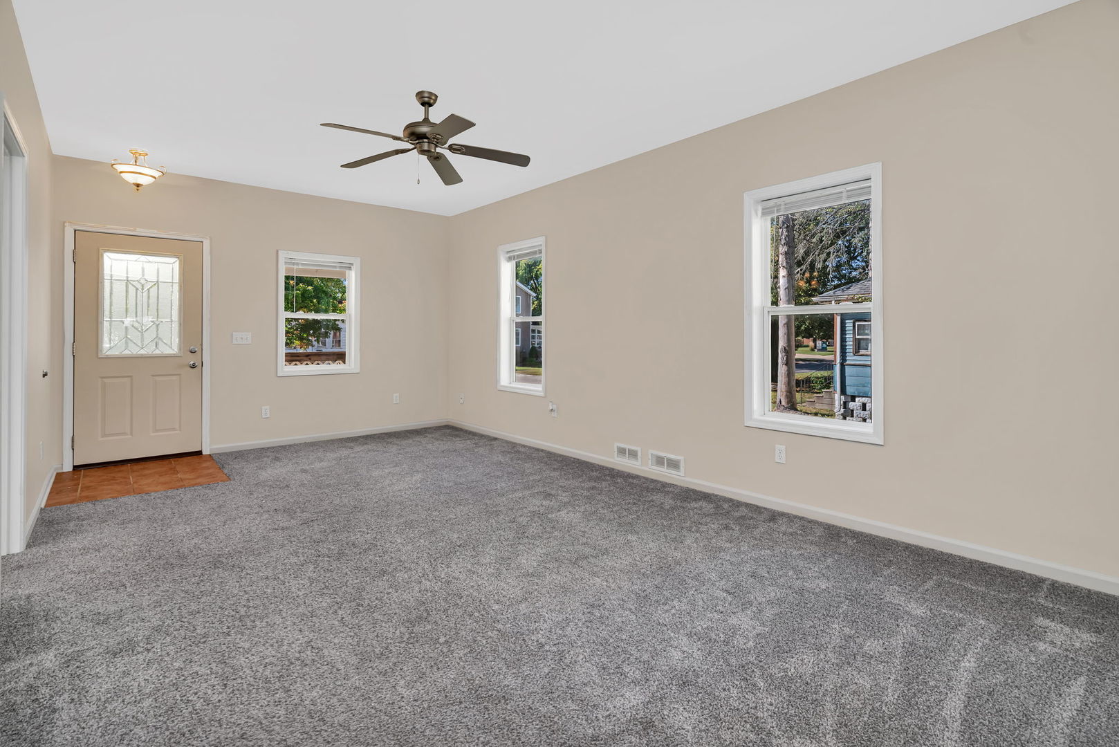 212 East Chippewa Street Dwight, IL 60420 - Photo 5 of 32 a view of an empty room with a window