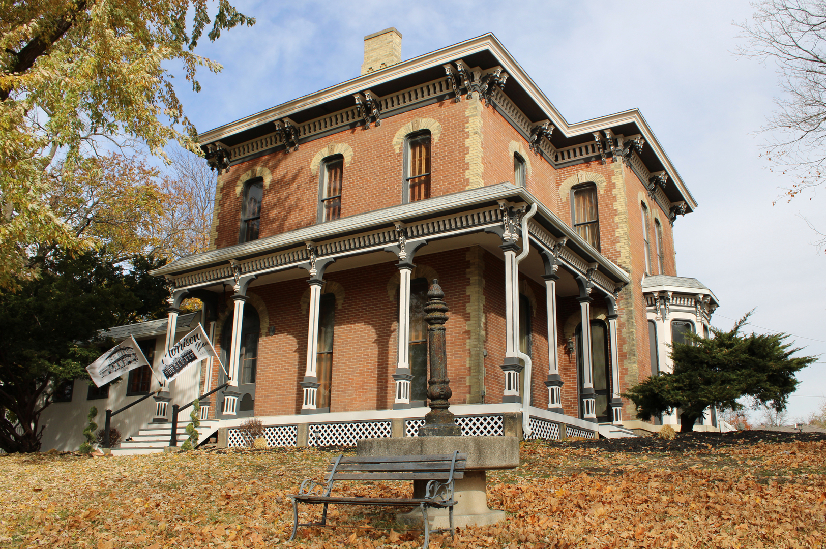 402 West Lincoln Way Morrison, IL 61270 - Photo 2 of 43 a view of a white house with large windows
