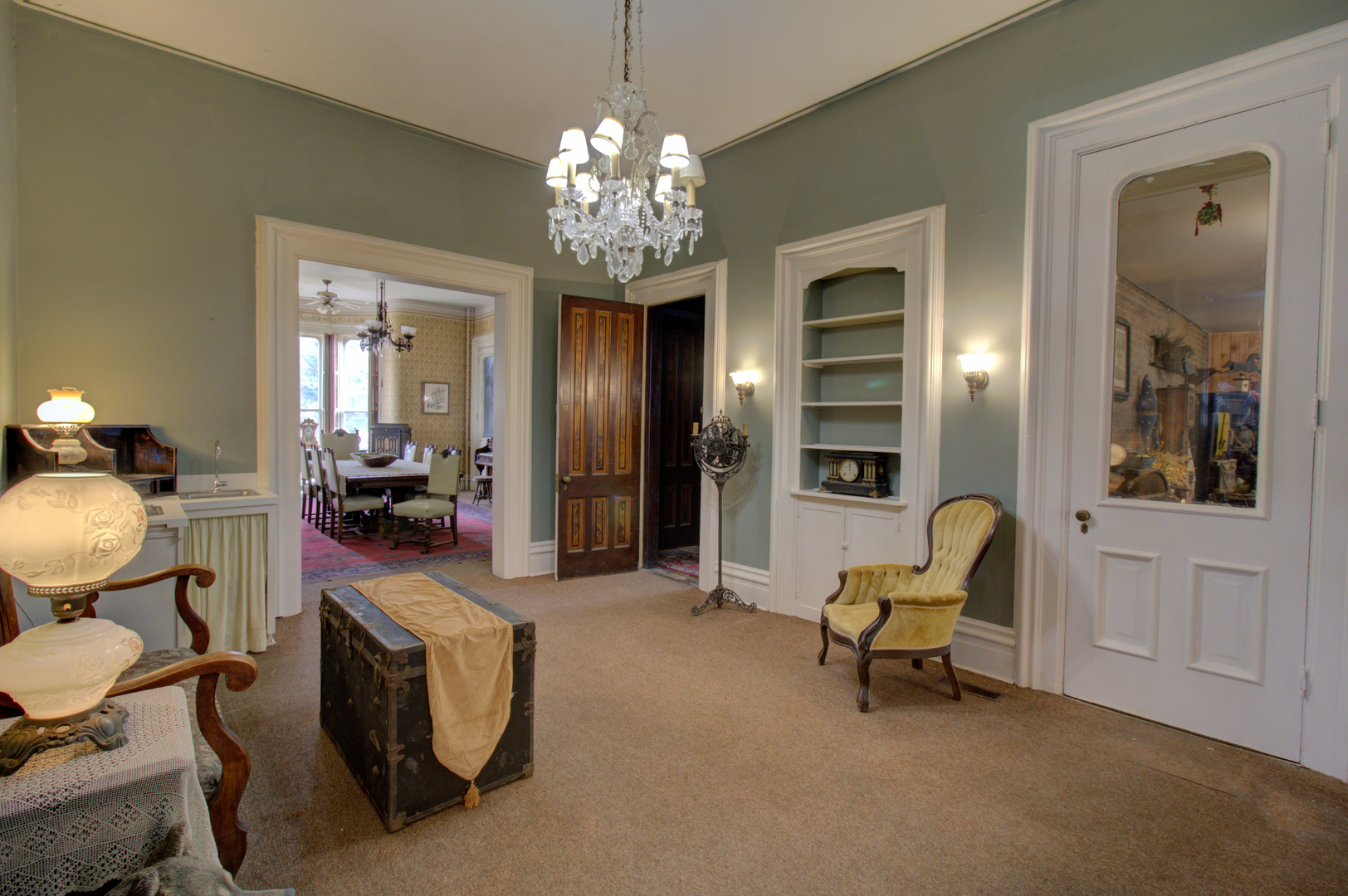 402 West Lincoln Way Morrison, IL 61270 - Photo 28 of 43 a living room with furniture and a chandelier
