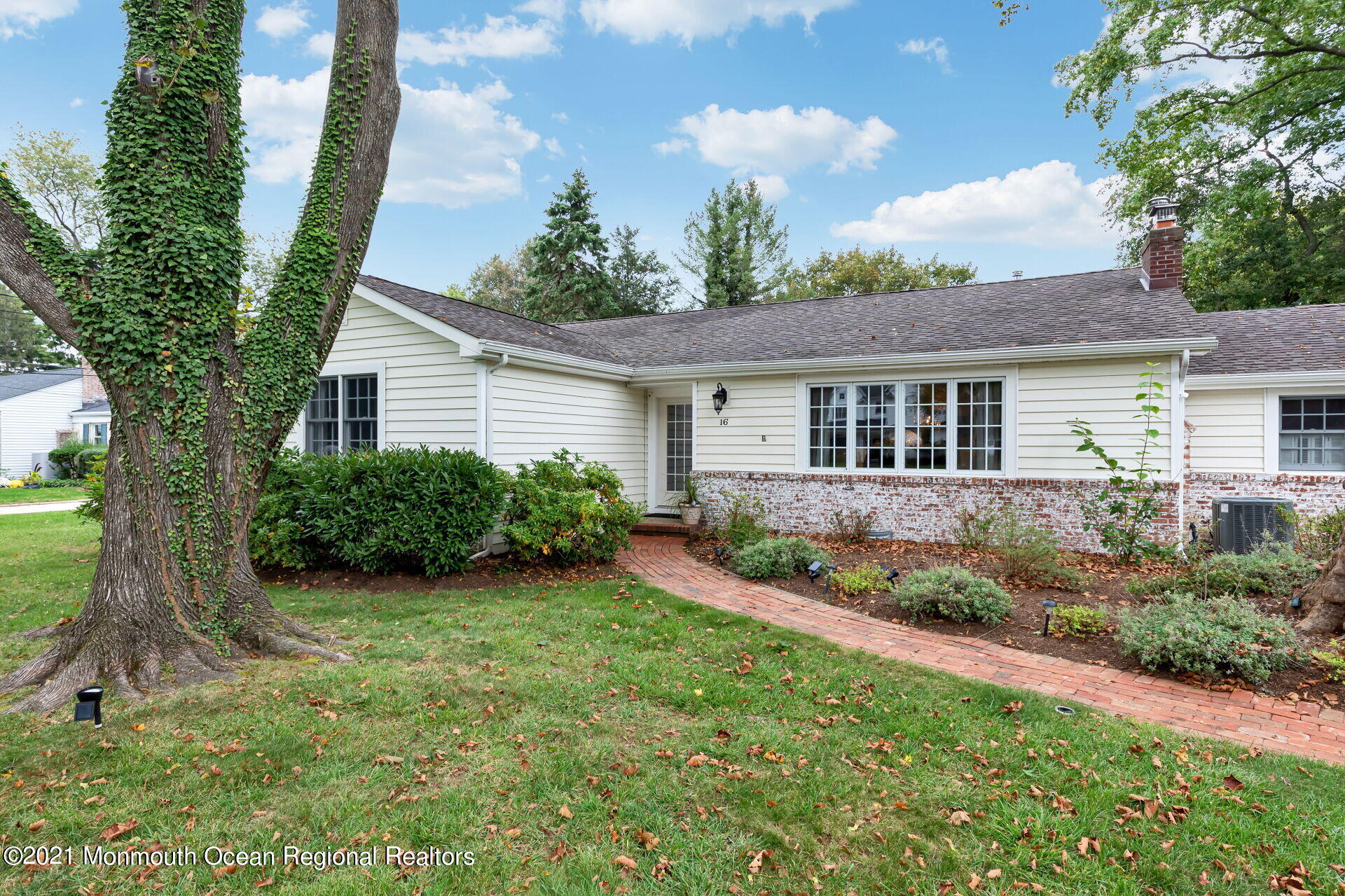 16 Westwood Road Little Silver, NJ 07739 - Photo 3 of 39 a front view of a house with garden