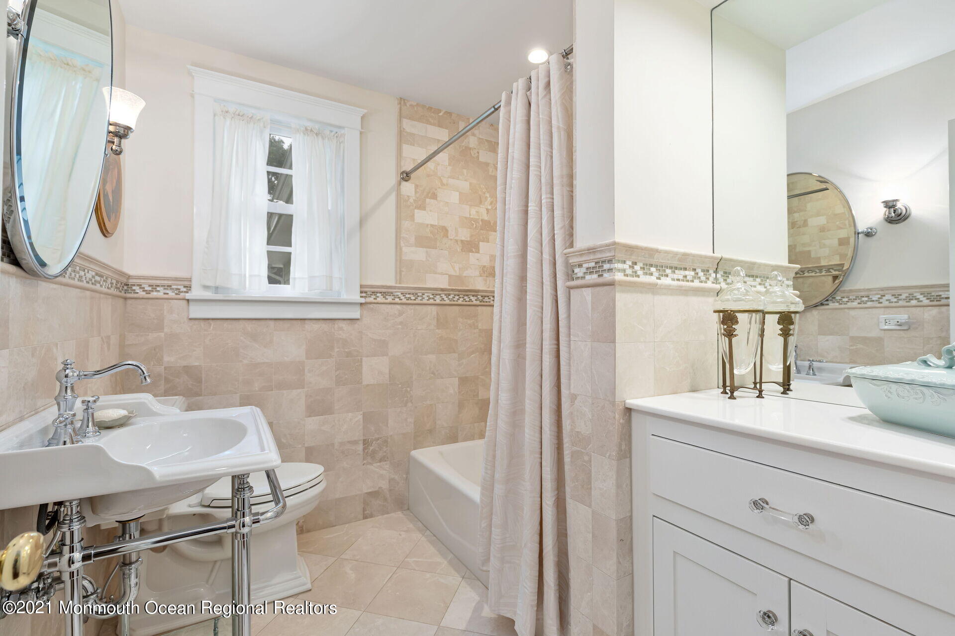 16 Westwood Road Little Silver, NJ 07739 - Photo 29 of 39 a bathroom with a sink and a mirror