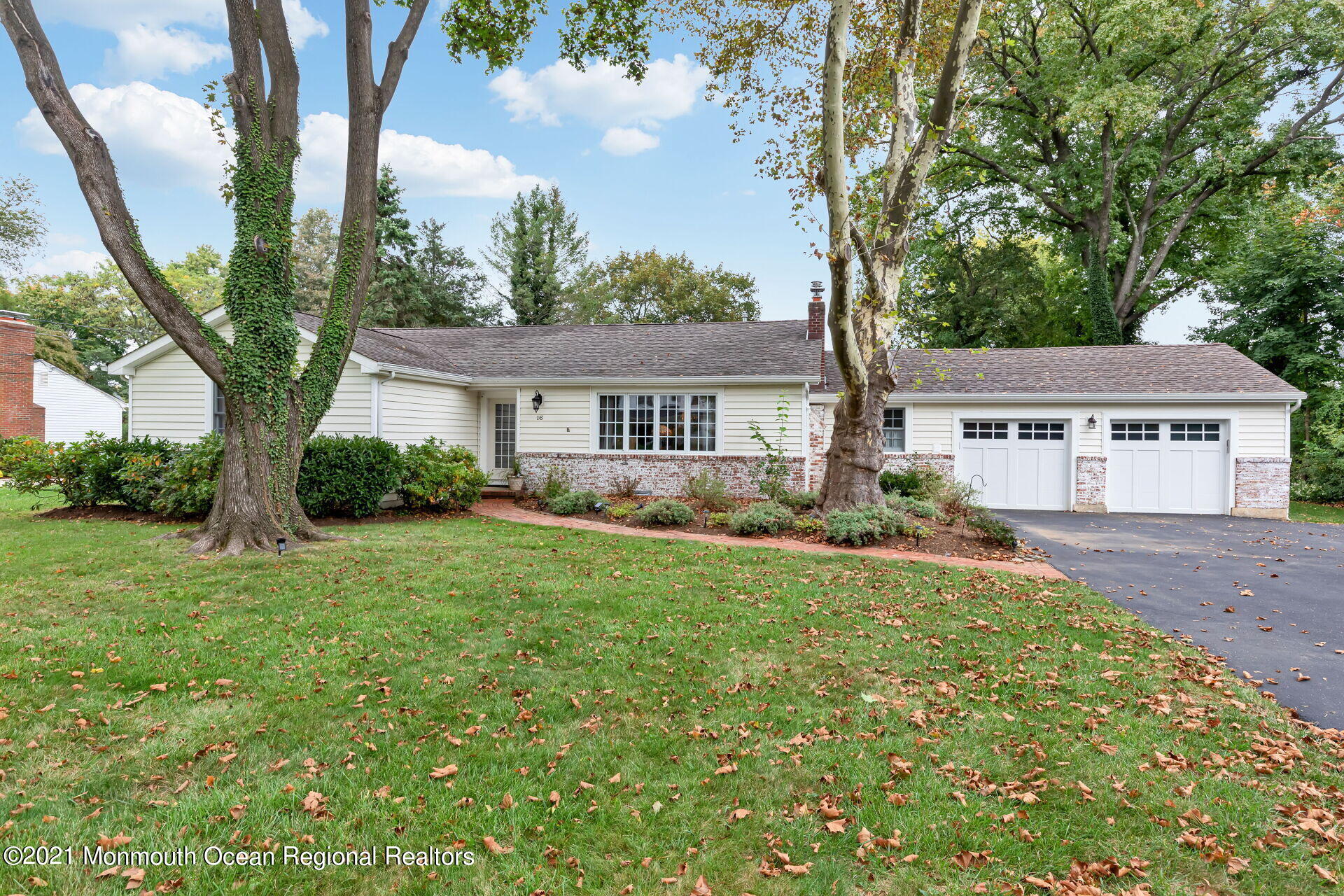 16 Westwood Road Little Silver, NJ 07739 - Photo 5 of 39 front view of a house with a yard