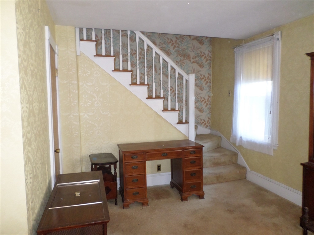 9 Douglas Road Saugus, MA 01906 - Photo 13 of 31 a view of entryway and hall with wooden floor