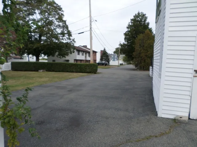a view of a house with a street