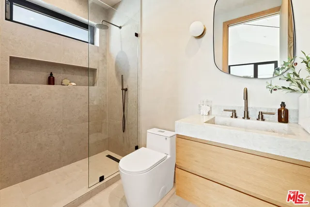 a view of a garden with patio