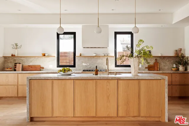 a shelf with cup and plates