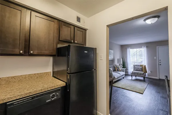 a kitchen with a stove and a microwave