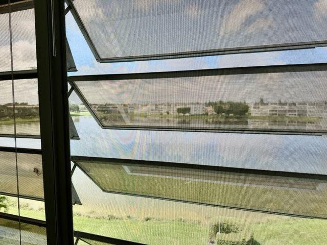 4067 Exeter Boca Raton, FL 33434 - Photo 11 of 38 Enclosed Patio w/Lake View