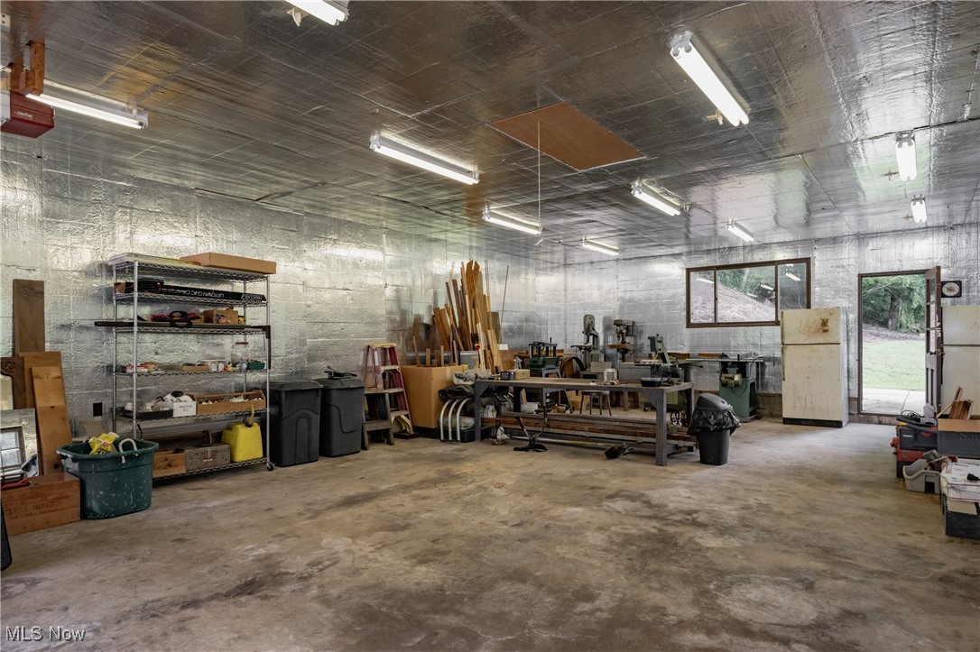 8089 Elk Fork Road Middlebourne, WV 26149 - Photo 39 of 50 Primary Garage Heated/AC Insulated Whole Building Generator, Wood Shop