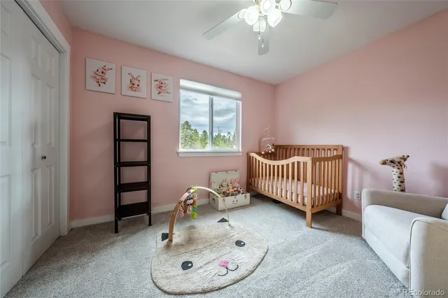 a room with stairs and a mirror