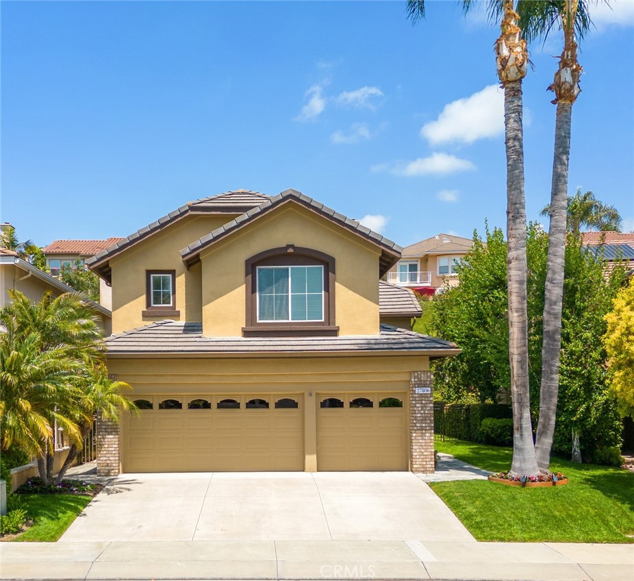 27806 Homestead Road Laguna Niguel, CA 92677 - Photo 1 of 1 a front view of a house with a garden and yard