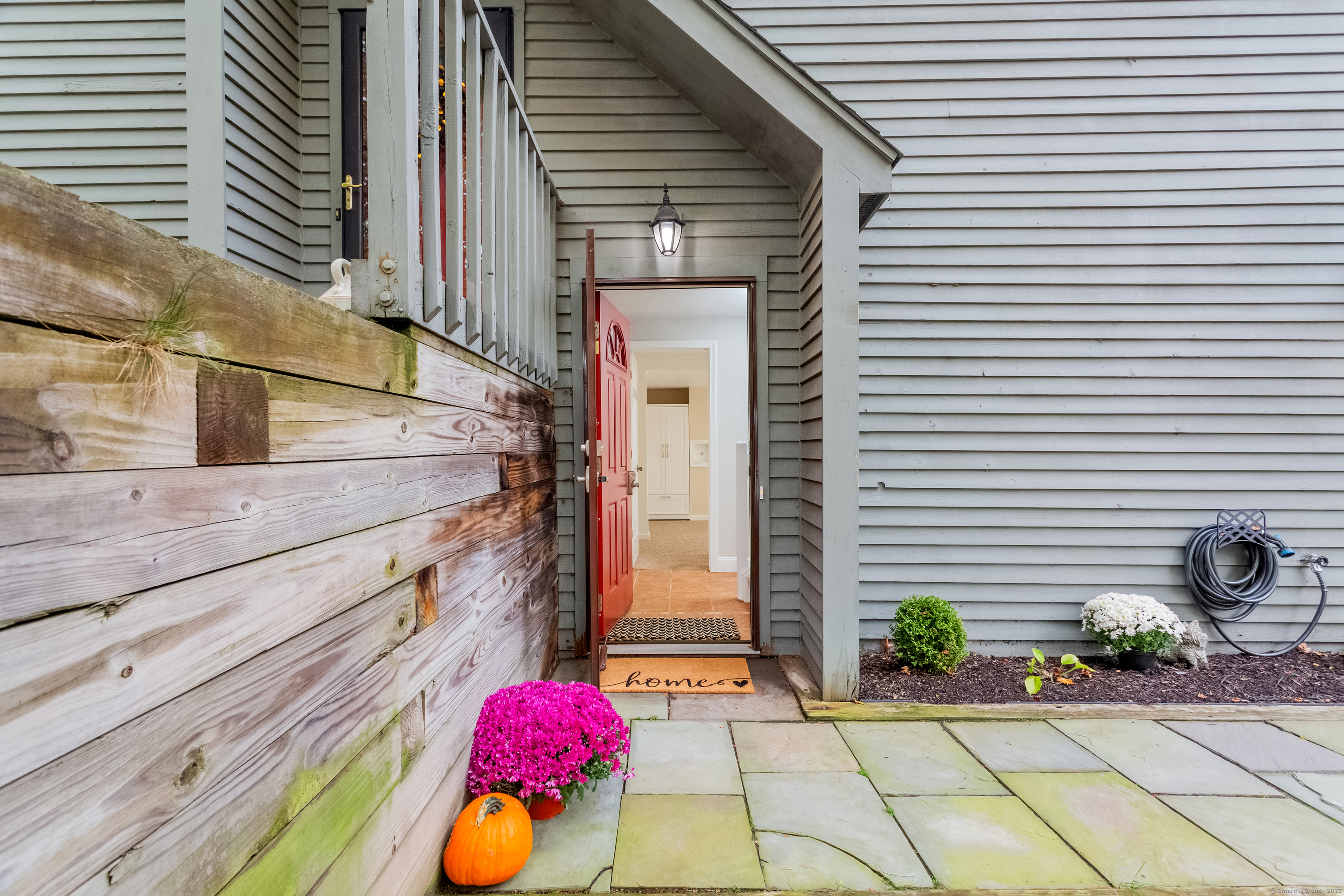 4 Pond View Drive, Unit 4 Brookfield, CT 06804 - Photo 3 of 38 a view of a terrace with chairs and potted plants
