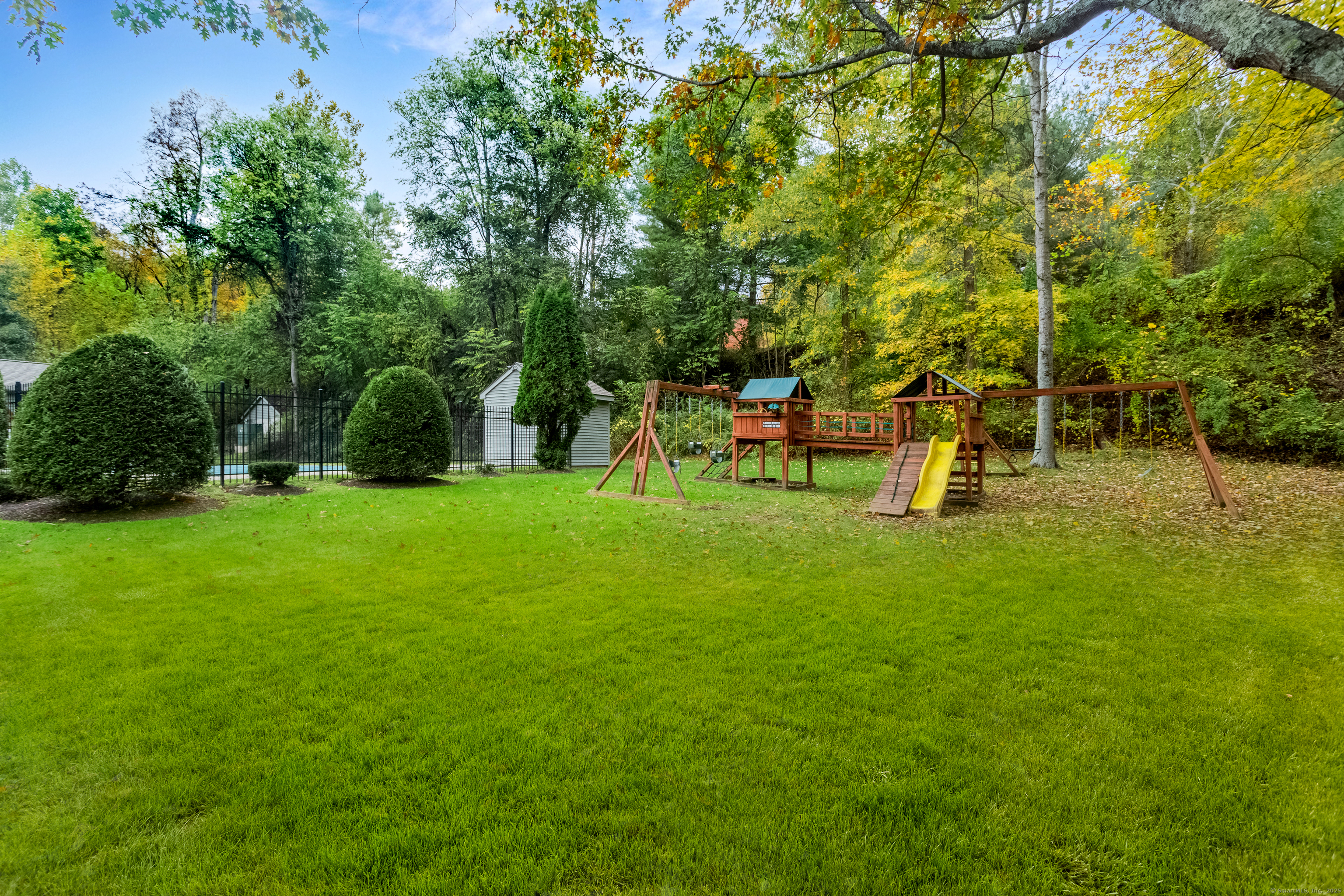 4 Pond View Drive, Unit 4 Brookfield, CT 06804 - Photo 33 of 38 a view of a park with swings and a tree