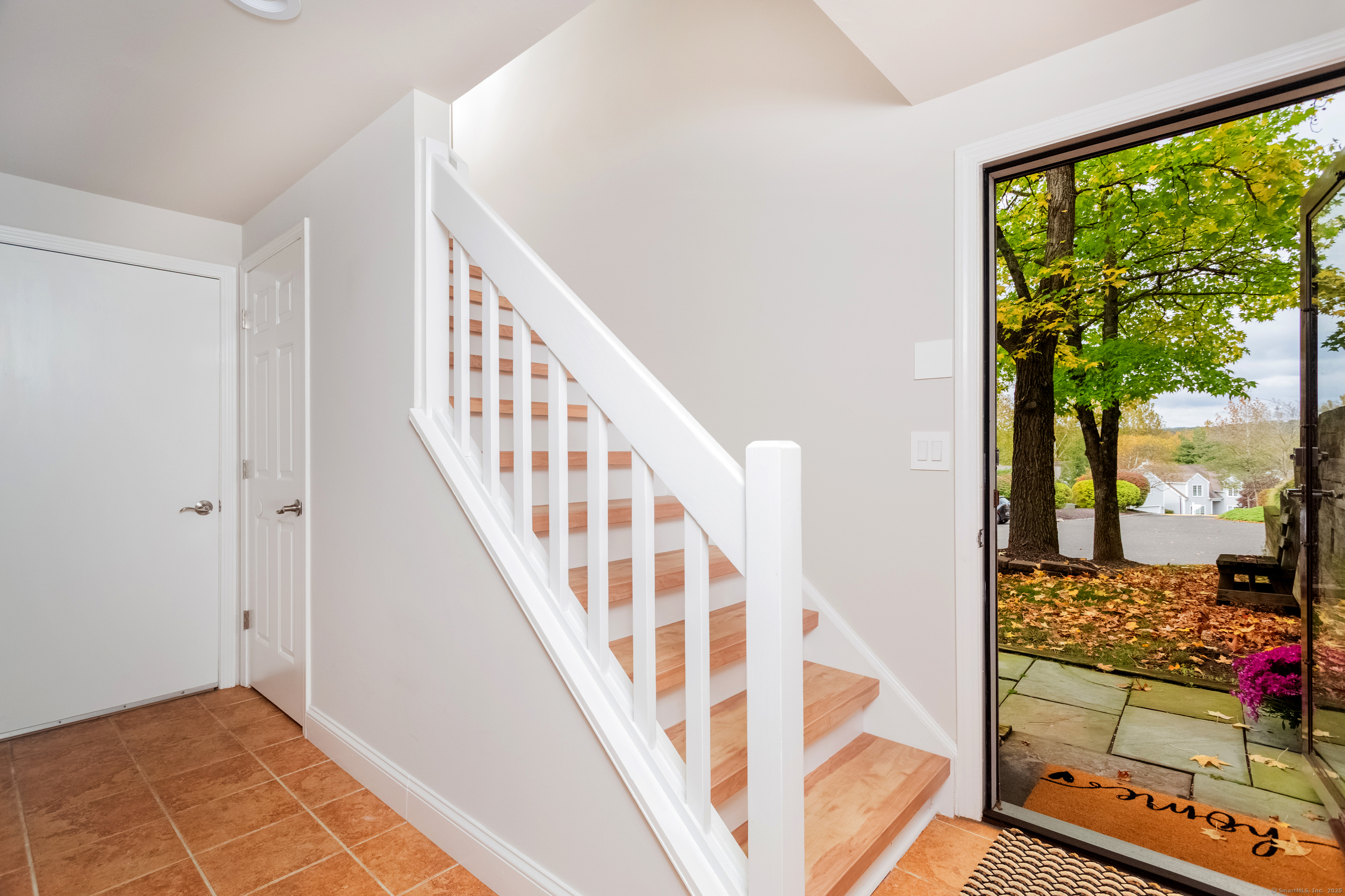 4 Pond View Drive, Unit 4 Brookfield, CT 06804 - Photo 5 of 38 a view of a hallway with a livingroom with furniture