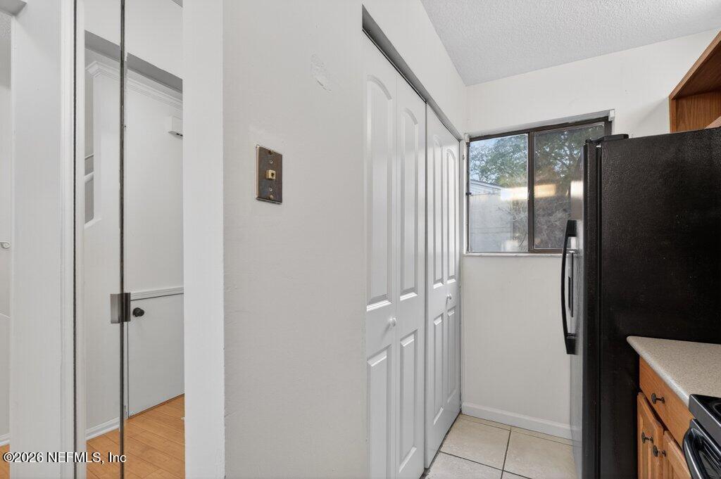 3801 Crown Point Road, Unit 2072 Jacksonville, FL 32257 - Photo 12 of 38 a bathroom with a shower and a glass door