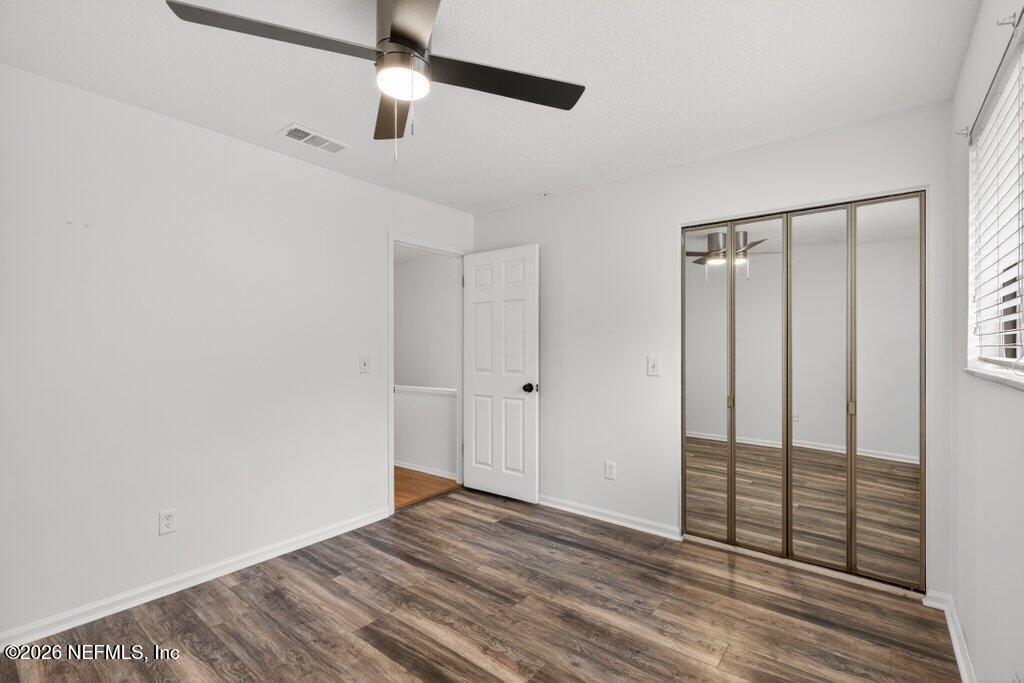 3801 Crown Point Road, Unit 2072 Jacksonville, FL 32257 - Photo 29 of 38 wooden floor in an empty room