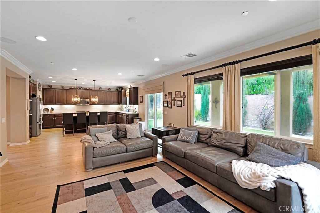 44260 Nighthawk Pass Temecula, CA 92592 - Photo 12 of 55 a living room with furniture and a large window