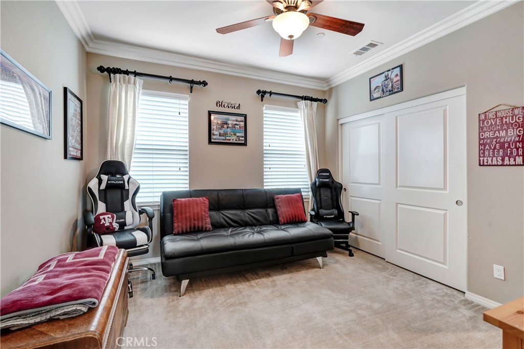 44260 Nighthawk Pass Temecula, CA 92592 - Photo 16 of 55 a living room with furniture and a window