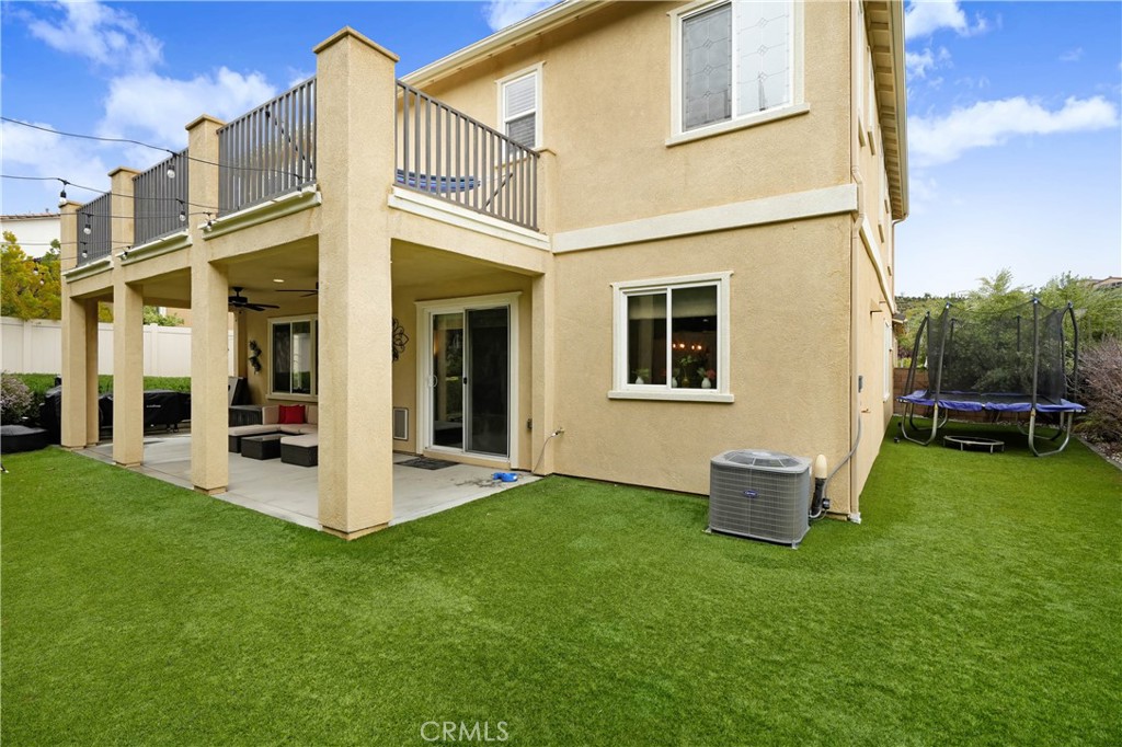 44260 Nighthawk Pass Temecula, CA 92592 - Photo 32 of 55 a view of an house with backyard porch and kitchen