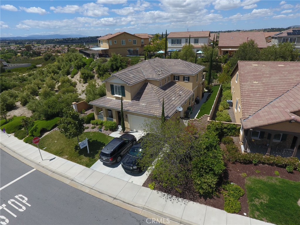 44260 Nighthawk Pass Temecula, CA 92592 - Photo 50 of 55 an aerial view of a house with a garden