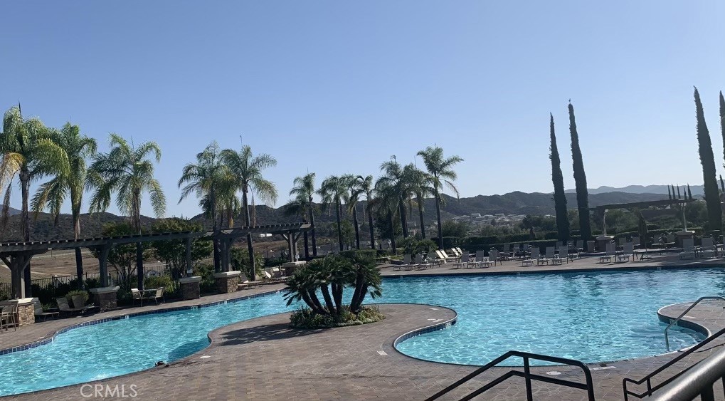 44260 Nighthawk Pass Temecula, CA 92592 - Photo 54 of 55 a view of a lake with a table and chairs