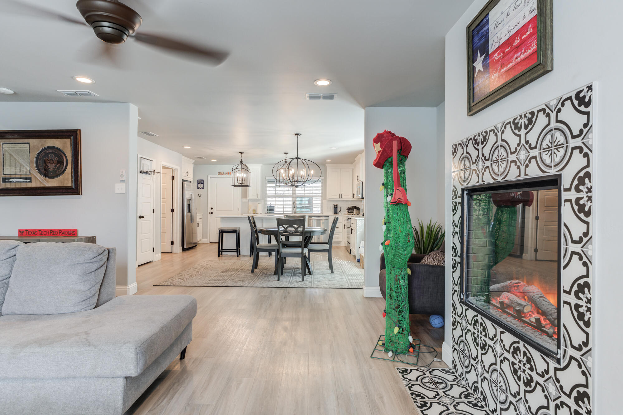 2414 25th Street Lubbock, TX 79411 - Photo 11 of 61 a living room with furniture and a fireplace
