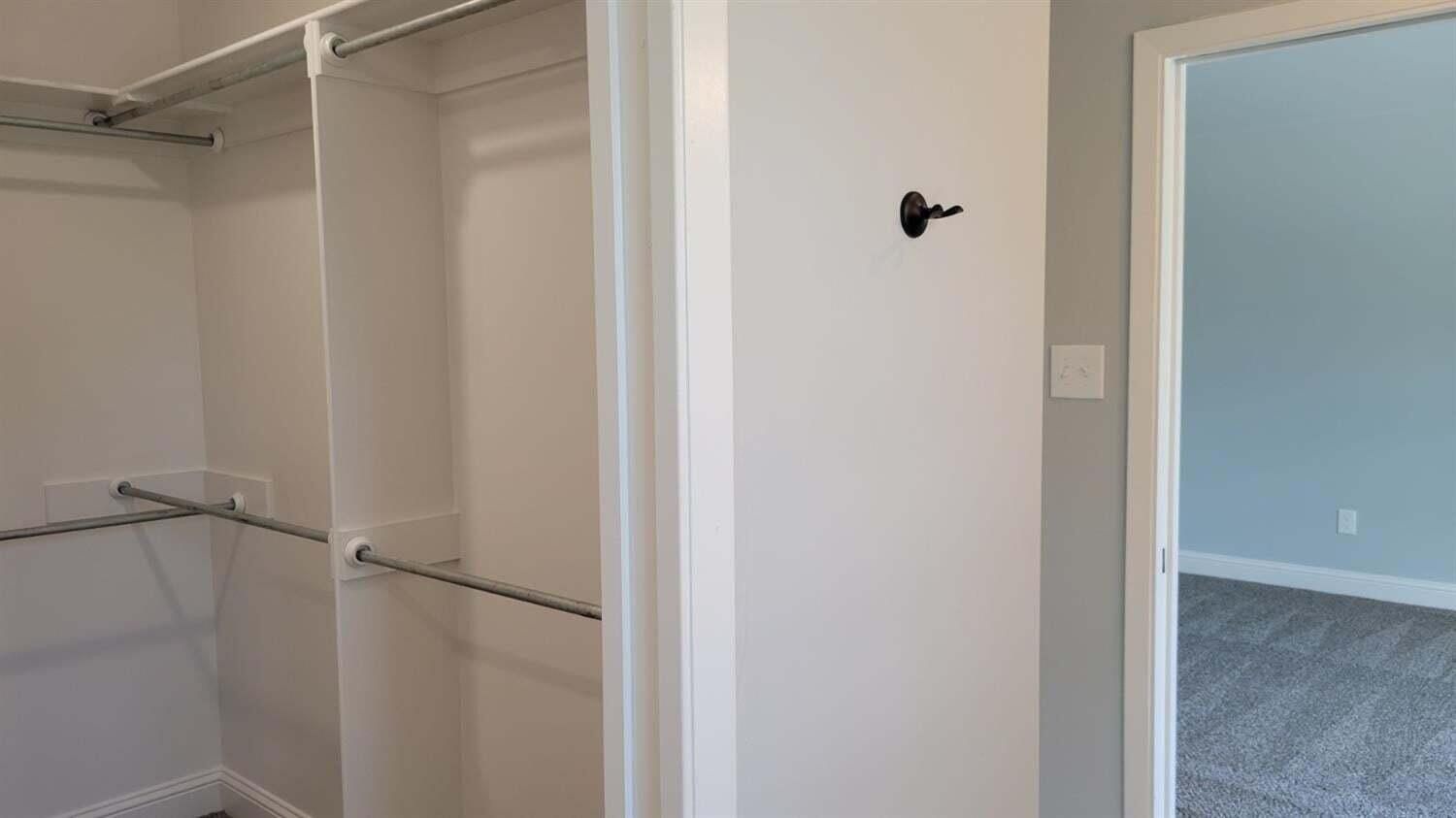 2414 25th Street Lubbock, TX 79411 - Photo 28 of 61 a bathroom with a glass shower door